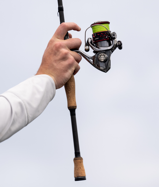 brell's fishing pole B'N'M Graphite Little Jewel brass plated guides and a Portuguese cork handle Scheels Outfitters Pro Angler Cork